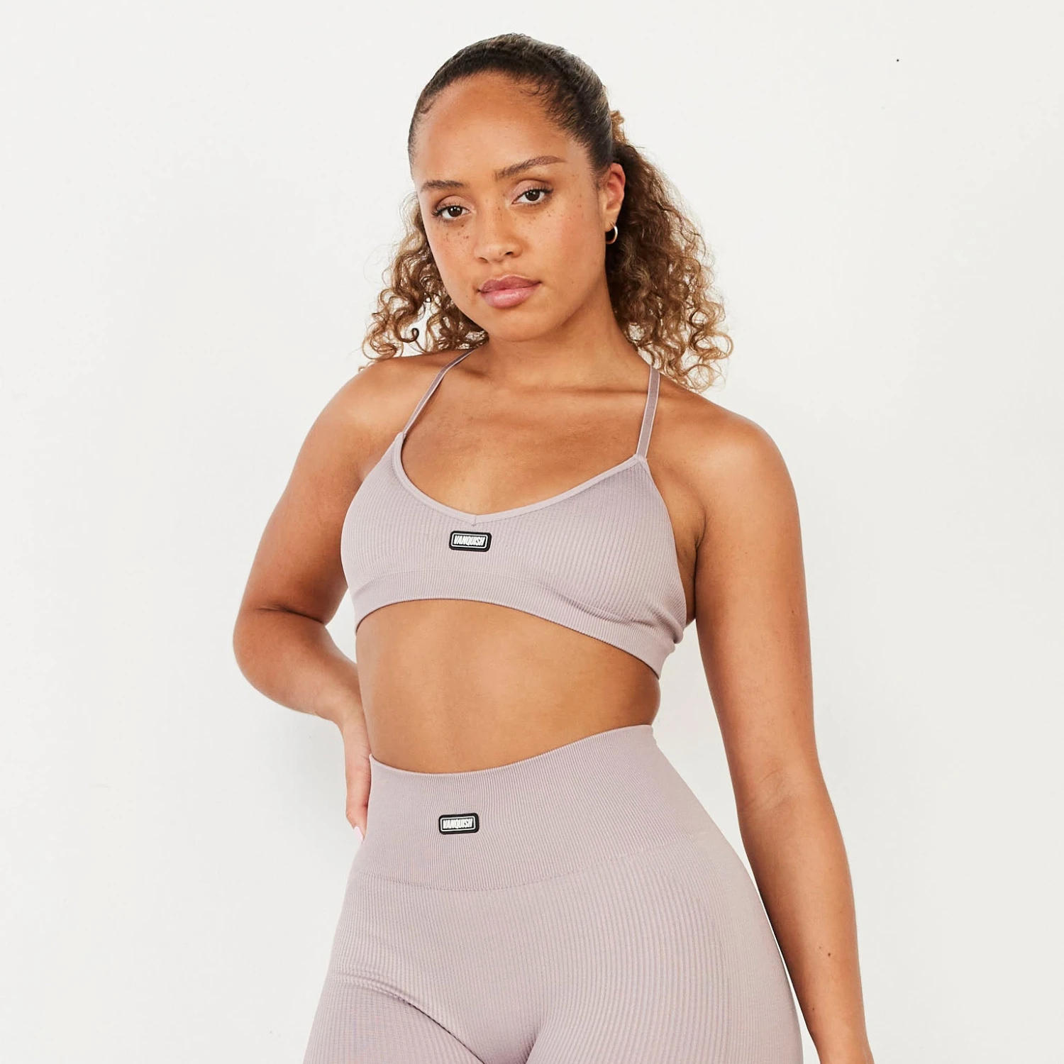 Vanquish Ribbed Seamless Blush Cross Back Low Support Bra 1 Vanquish Ribbed Seamless Blush Cross Back Low Support Bra