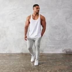 Vanquish Essential White Regular Fit Stringer Vest -Vanquish Fitness Shop vanquish essential white regular fit stringer vest 458263